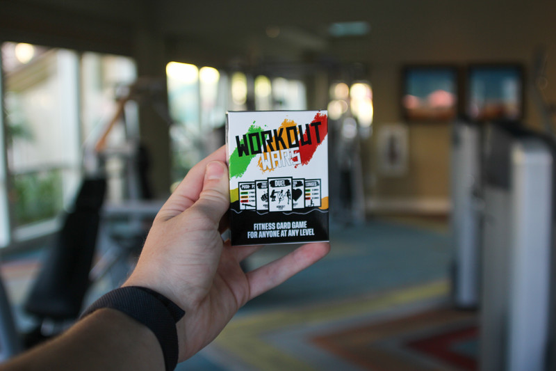 The complete Workout Wars box held in one hand, with the hand visible for scale.